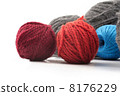 Several balls of wool on a white background 8176229