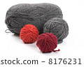 Several balls of wool on a white background 8176231