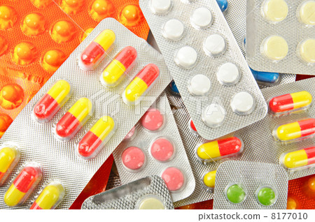 Multicolored medicine pills background Multicolored medicine pills background 8177010