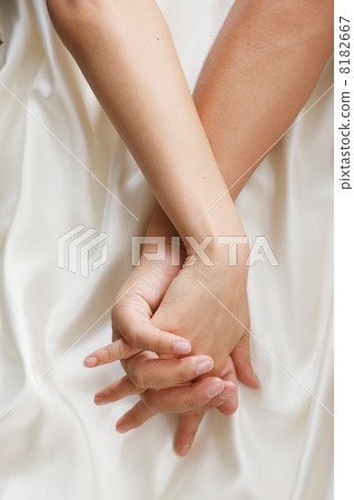 Male and female hands 8182667