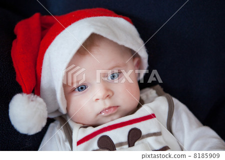 Little baby boy in red Christmas cap Little baby boy in red Christmas cap 8185909