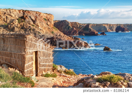 Old fishing hut lodge on the beach. Portugal, Sagres. 8186214