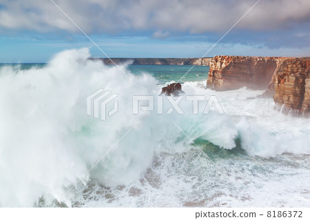 Giant sea wave going ashore in a storm. Giant sea wave going ashore in a storm. 8186372