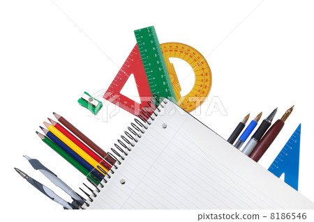 Set of office tools under a notebook to take notes. Place in the 8186546