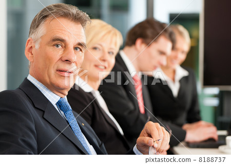 Business - team in office 8188737
