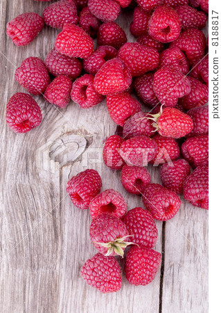 Sweet raspberry on wooden tables Sweet raspberry on wooden tables 8188817