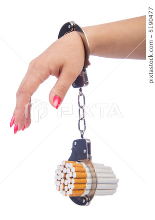 Addition concept with cigarettes and handcuffs 8190477