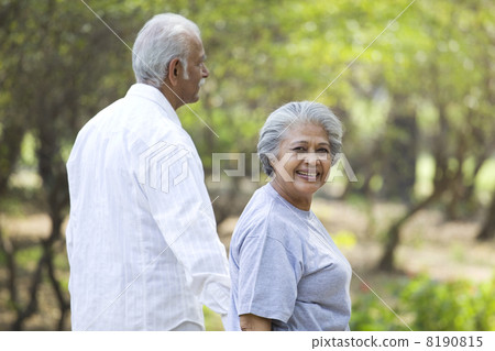 Business executives talking on a mobile phone 8190815