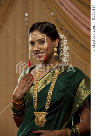 Portrait of gorgeous young bride smiling 8191414
