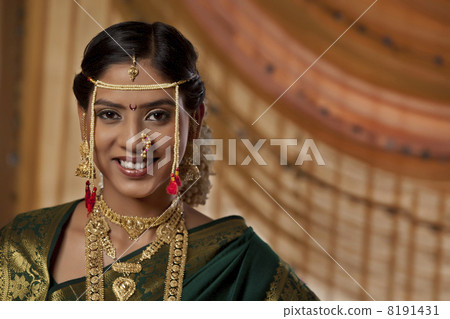 Portrait of young Maharashtrian bride smiling Portrait of young Maharashtrian bride smiling 8191431