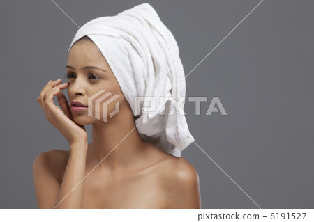 Close-up of beautiful woman touching face Close-up of beautiful woman touching face 8191527
