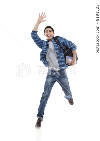 Excited young college student waving over white background Excited young college student waving over white background 8191528