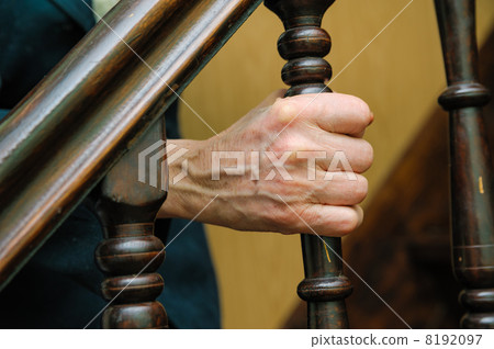 old woman wrinkled hands hold the handrail old woman wrinkled hands hold the handrail 8192097