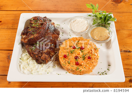 roast pork knuckle with cabbage roast pork knuckle with cabbage 8194594