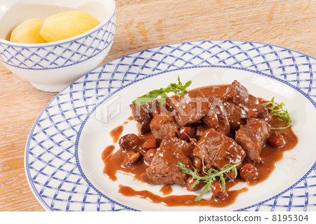 beef with hazelnuts beef with hazelnuts 8195304