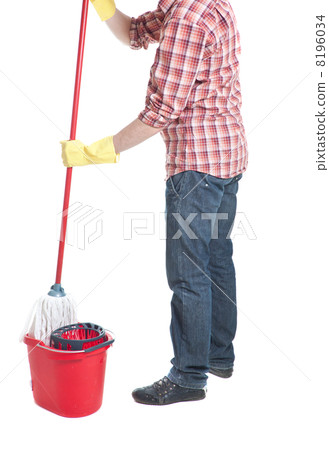 man puts the mop in a bucket 8196034