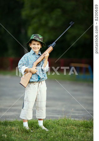 little boy with airgun little boy with airgun 8200689