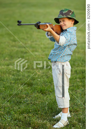little boy with airgun little boy with airgun 8200690