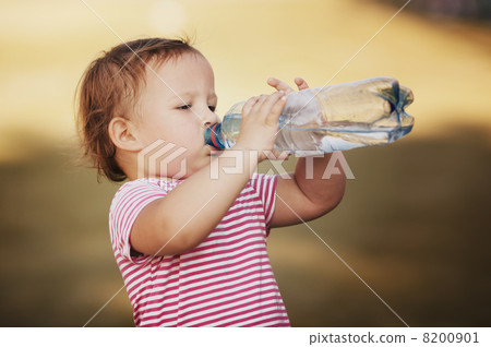 girl with bottle of mineral water girl with bottle of mineral water 8200901