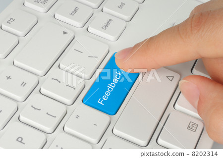Hand pushes blue feedback button . Hand pushes blue feedback button . 8202314