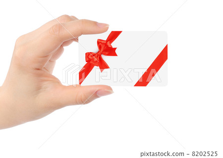 Hand with white card and red bow  8202525