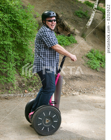 Men having fun on segway Men having fun on segway 8202622