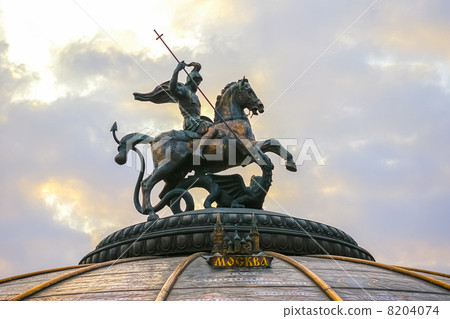 A man on a horse killing a snake A man on a horse killing a snake 8204074