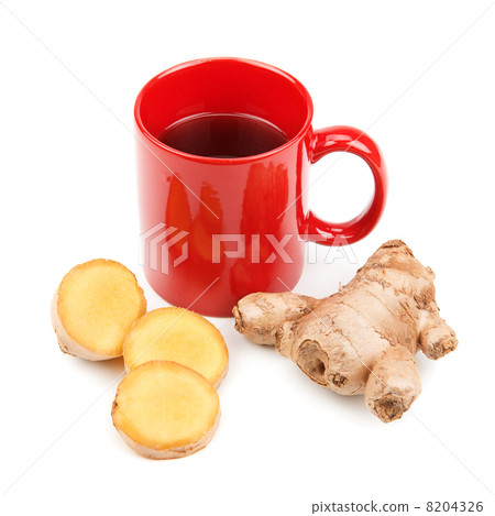 ginger root and a cup of tea ginger root and a cup of tea 8204326