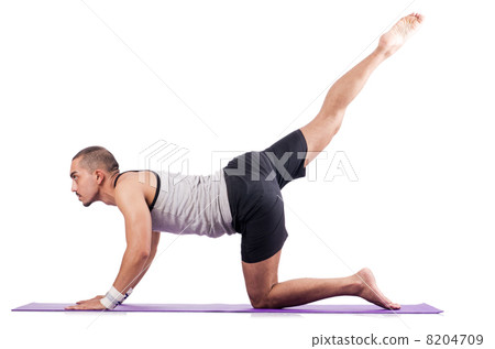 Man doing exercises on white 8204709