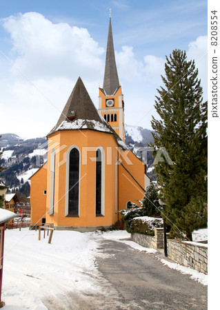 Church tower in Alpine village Bad Hofgastein , Austria. Church tower in Alpine village Bad Hofgastein , Austria. 8208554