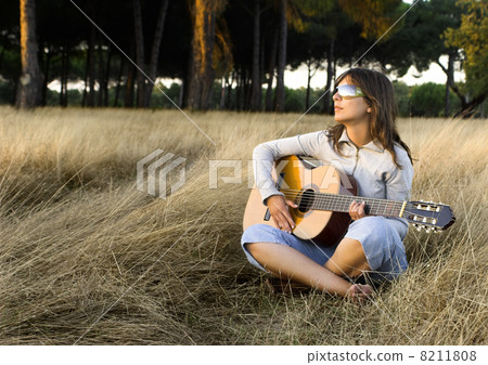 Playing guitar Playing guitar 8211808