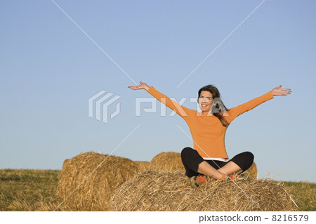 Beautiful woman with open arms 8216579