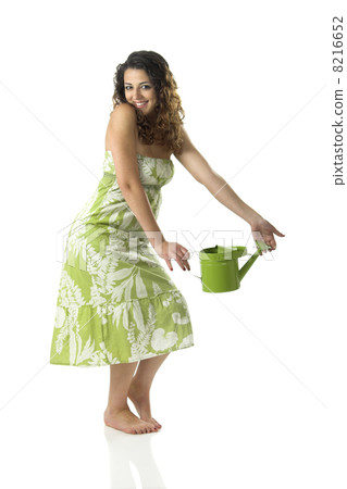 Woman with a watering can 8216652