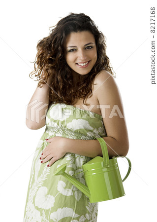 Woman with a watering can Woman with a watering can 8217168