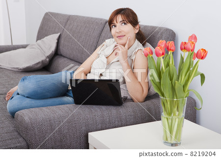 Working with a laptop Working with a laptop 8219204