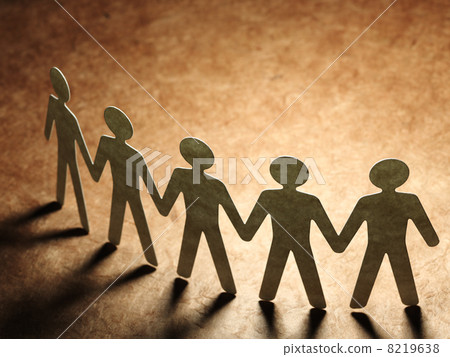 Group of paper people holding hands. Group of paper people holding hands. 8219638