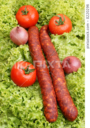 home made salami on some fresh organic salad 8220296