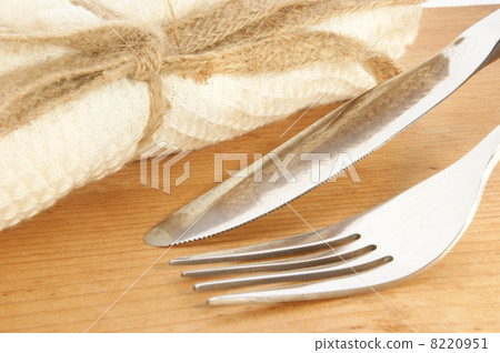 fork and knife on timber background 8220951