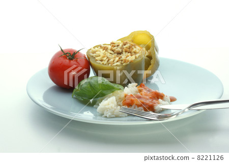 Green mince filled paprika with basil leaf and tomato Green mince filled paprika with basil leaf and tomato 8221126