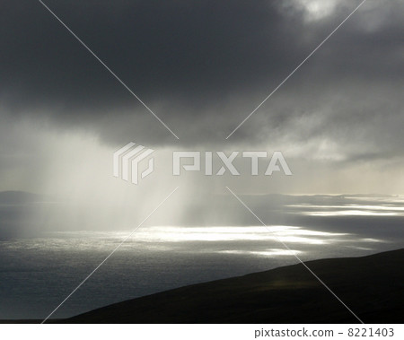 very dark rain clouds and sun rays very dark rain clouds and sun rays 8221403