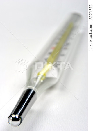 analogue clinical thermometer on a white background analogue clinical thermometer on a white background 8221752