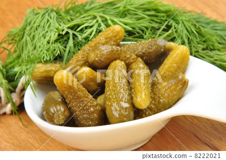 organic cornichons in a small white bowl 8222021