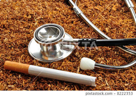 some unhealthy tobacco cigarette and a stethoscope 8222353