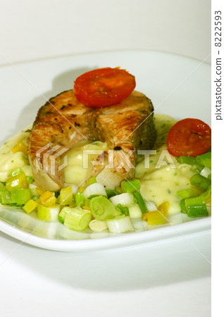 grilled salmon fillet on mashed potato and spring onion 8222593