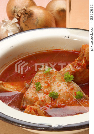 Carp fish soup in an old enamel bowl 8222632
