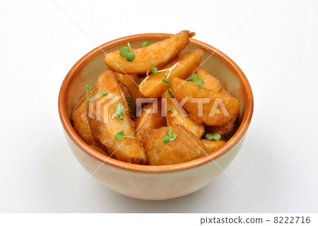 some fried potato wedges in a bowl 8222716
