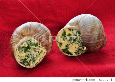 two snails with a delicious herb buttercream two snails with a delicious herb buttercream 8222791