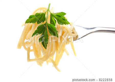 homemade organic spaghetti wrapped around a fork 8222838