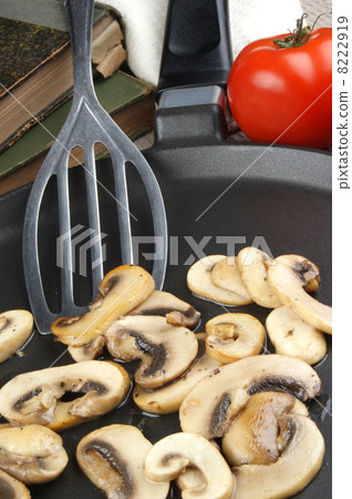 chopped and grilled mushrooms in a pan chopped and grilled mushrooms in a pan 8222919