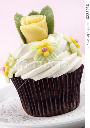 chocolate cupcake with butter cream and rose chocolate cupcake with butter cream and rose 8222938